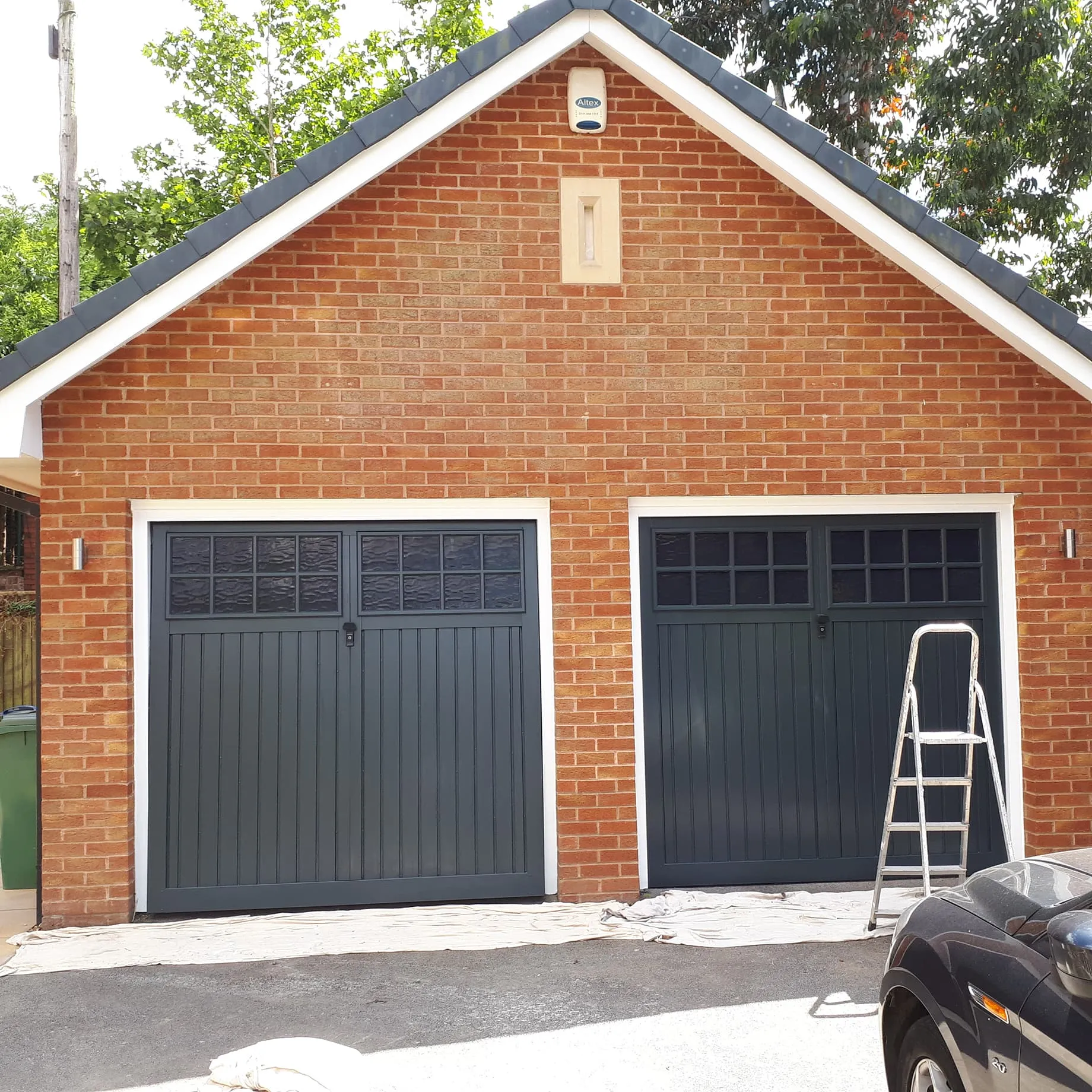 Exterior painting work by Blue Hawk Roofing